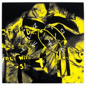 Slogan "If we die we're taking you with us" sur la couverture de l'album "Quelque chose tombe" de Racine
